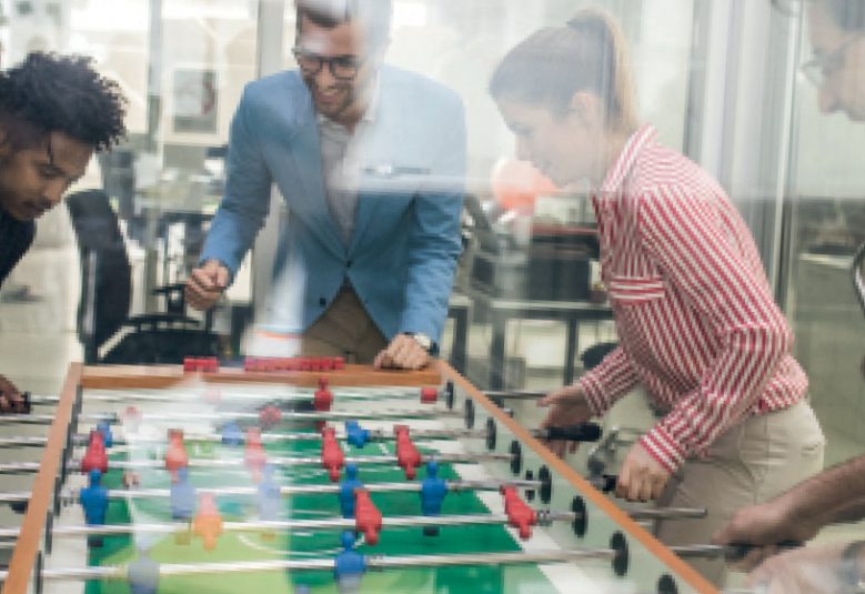 Tabletop games being played by colleagues at an office
