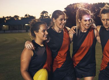 group of women on a sports field