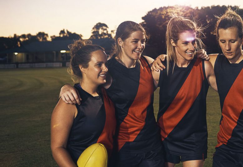 group of women on a sports field