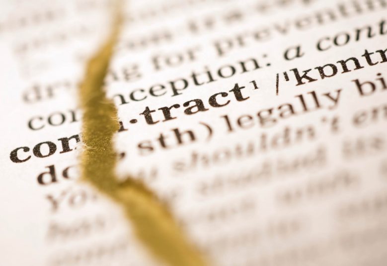 Close up of dictionary, focusing on the definition of contract