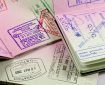 set of passports with visa and immigration stamps