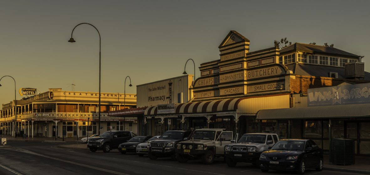 Cobar, Historic Shopfronts and Great Western Hotel at twilight