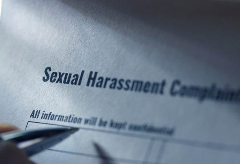 Pen filling in sexual harassment complaint form