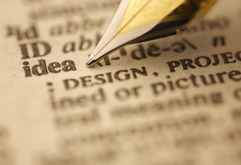 Section of dictionary with a pen pointing to the word 'idea'