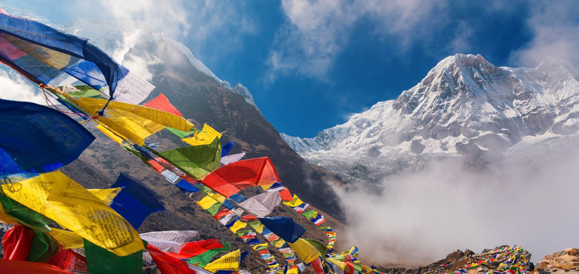 Himalayan prayer flags with Mt Annapurna in the background