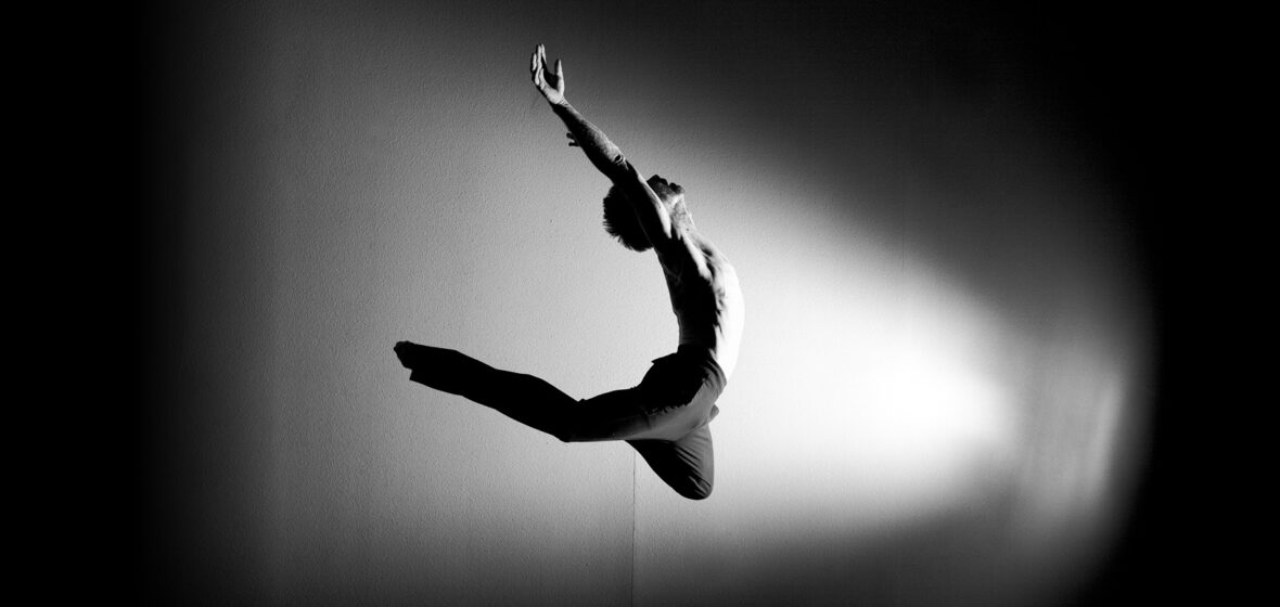 image of ballet dancer leaping to illustrate article on dancers and the law