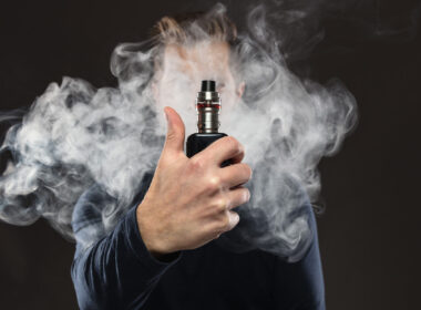 photo showing person using vaping products