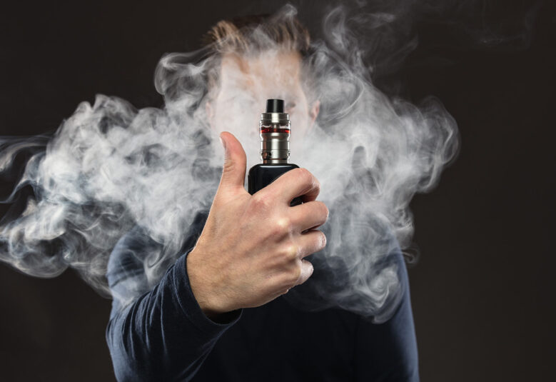 photo showing person using vaping products