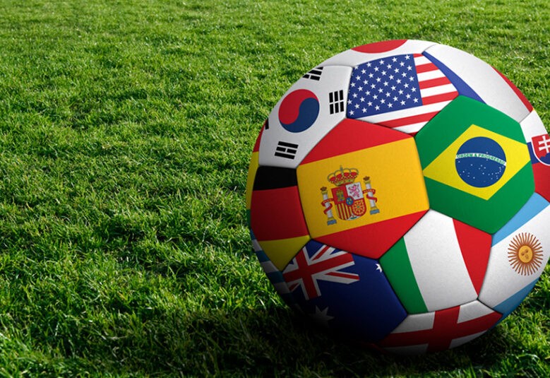 photo of soccer ball with world flags to illustrate World Cup soccer
