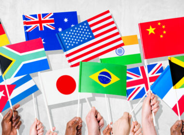 photo of different flags to show diverse community views on the Voice
