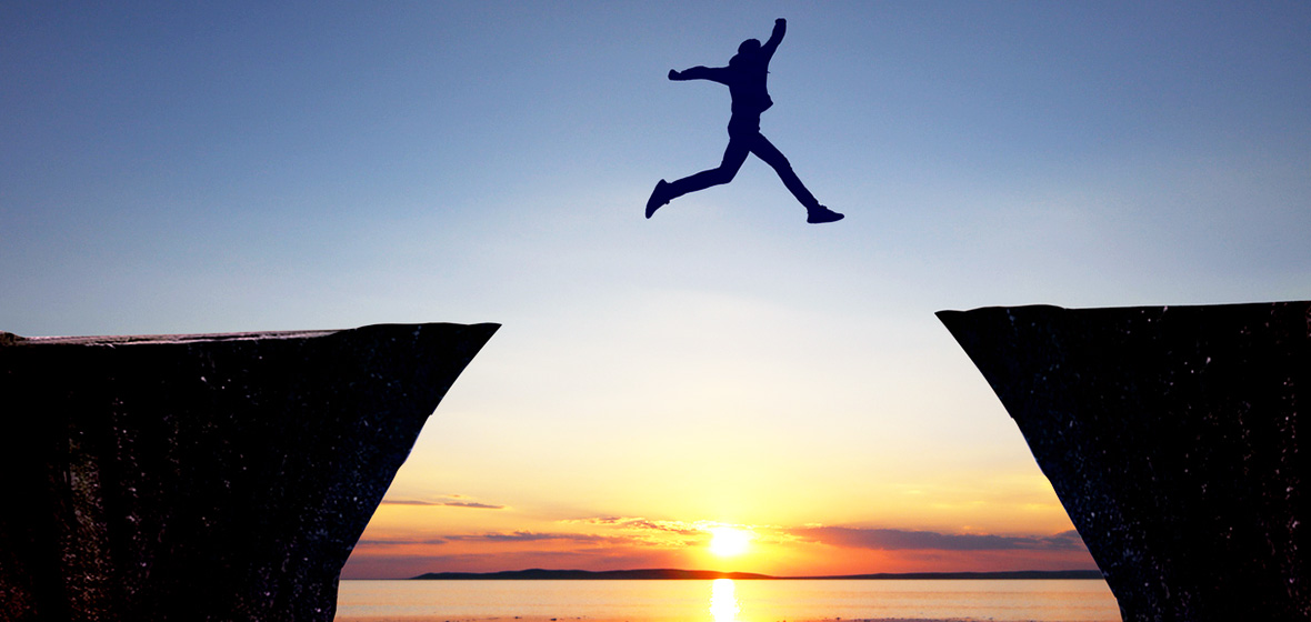 photo of person leaping across a gap to show legal career offers access to other professions